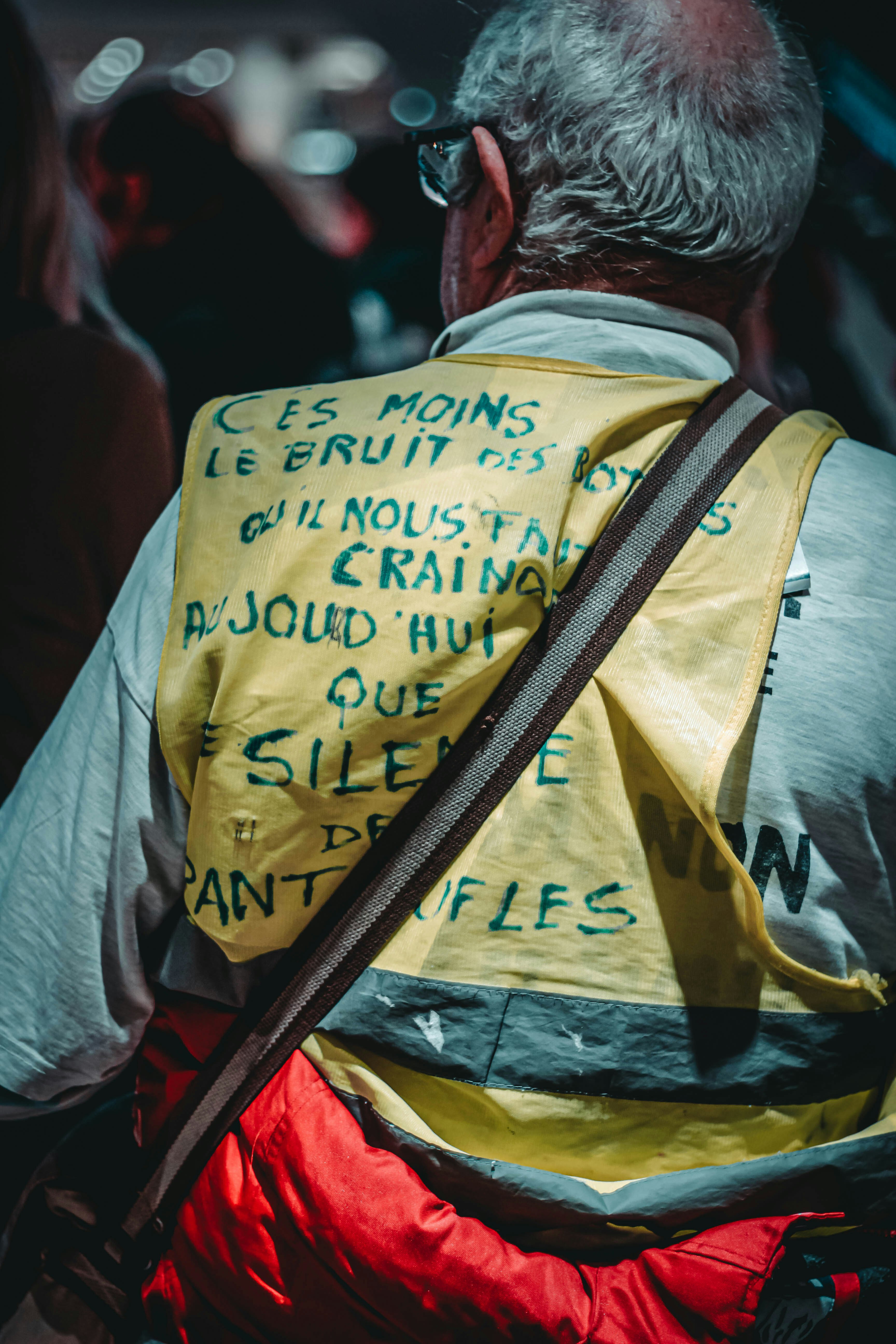 man wearing yellow vest